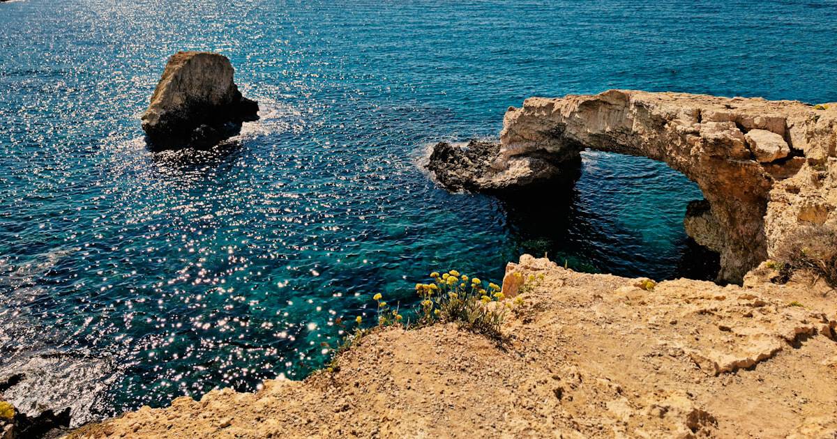 Bridge of Lovers sea arch over turquoise water in Ayia Napa, Cyprus