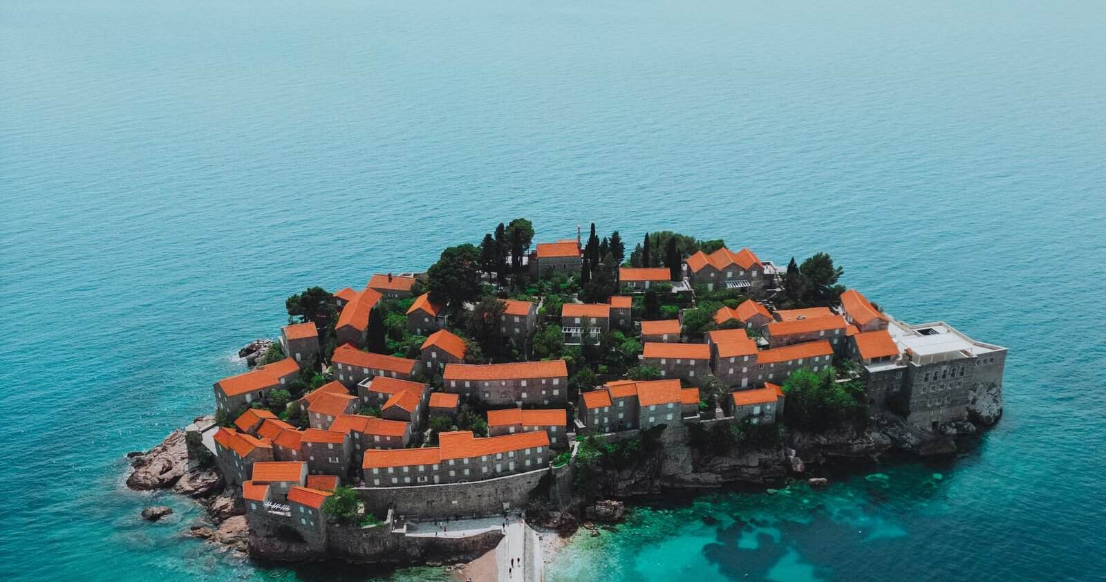 Aerial view of Sveti Stefan island on the turquoise Adriatic, Montenegro