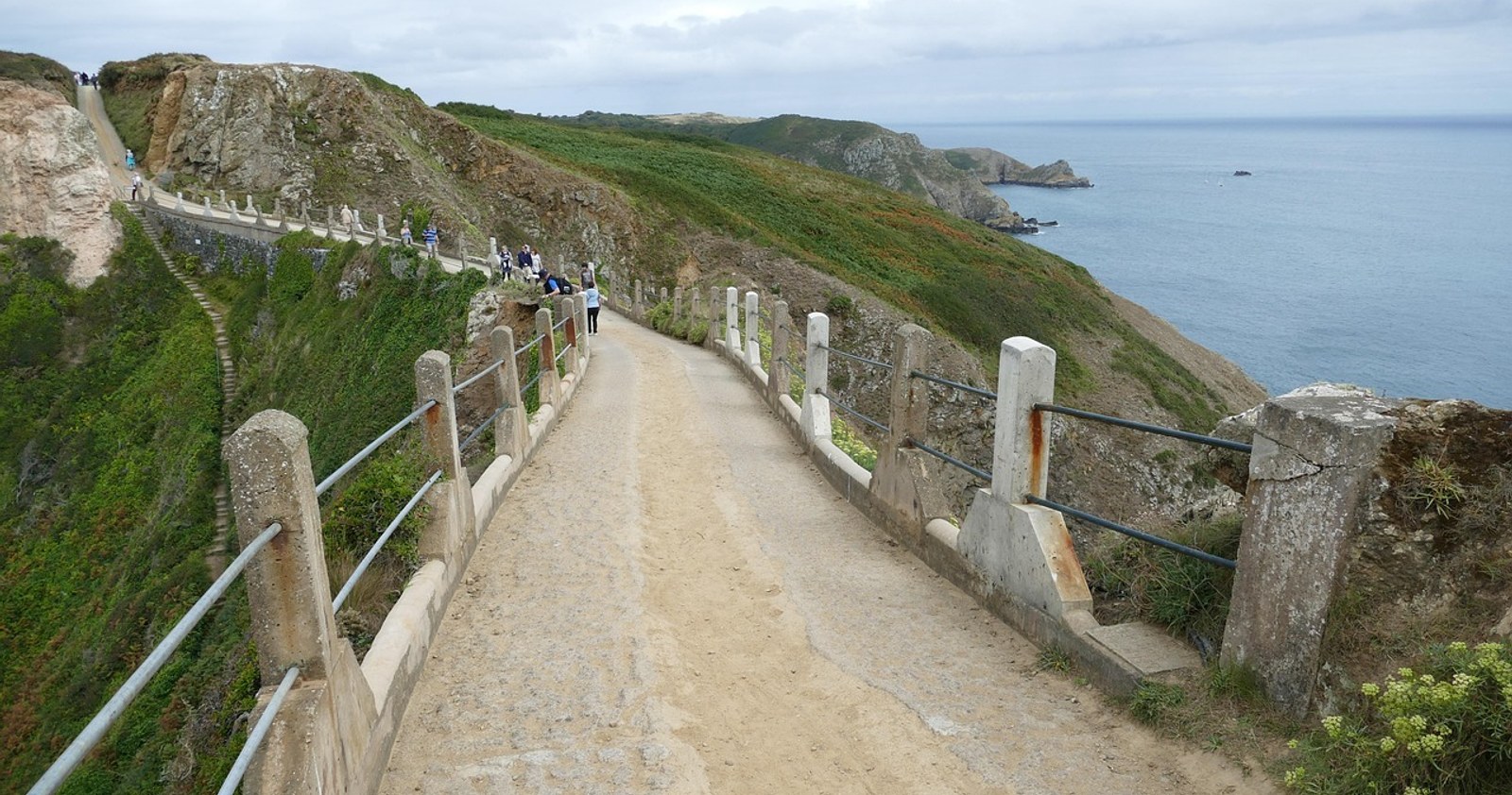 Clifftop path and bridge above the sea on the island of Sark in the Channel Islands
