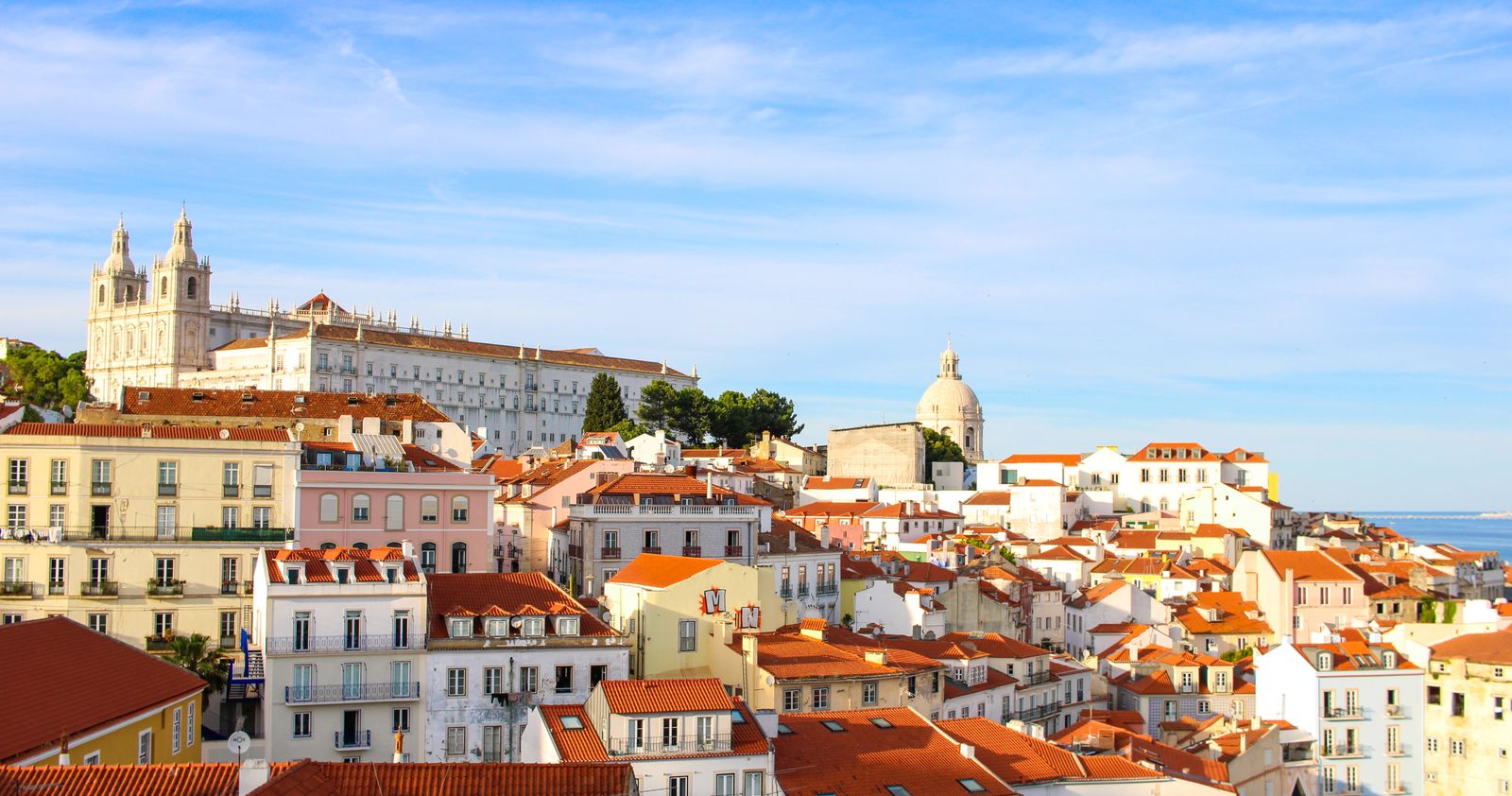 Terracotta rooftops of Lisbon’s historic Alfama district, Portugal
